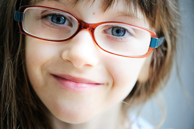 Child wearing glasses